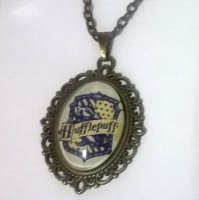 Медальйон Harry Potter Hufflepuff 4х3 см.